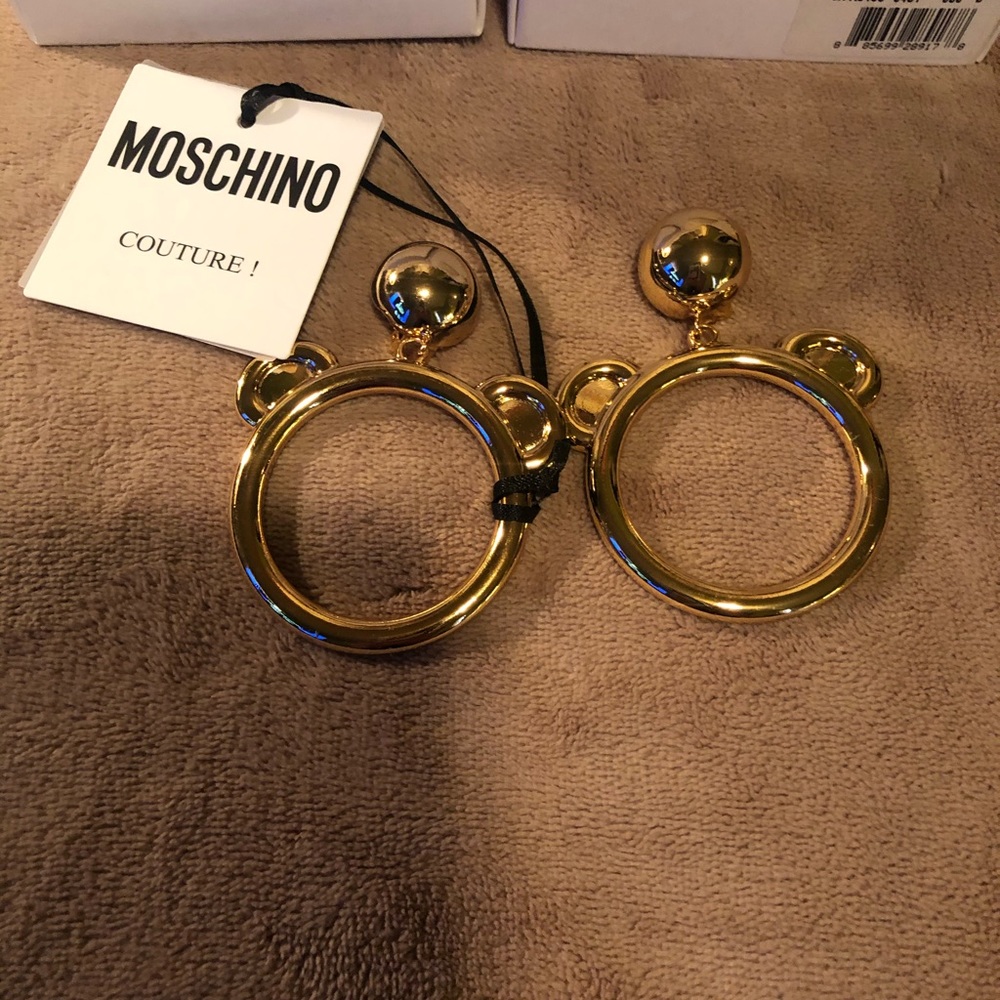 Never before worn Moschino teddy bear earrings.